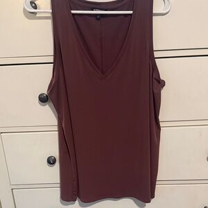 Work once. Nice top for dressing up. Cute w jeans, or blazer. Purpleish color